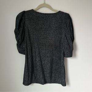 DKNY sparkle puff shoulder top in black.